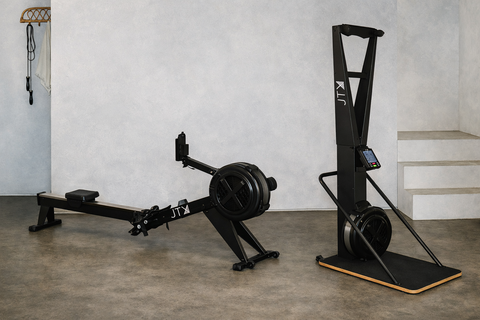 A ski machine and air rowing machine in a home setting.