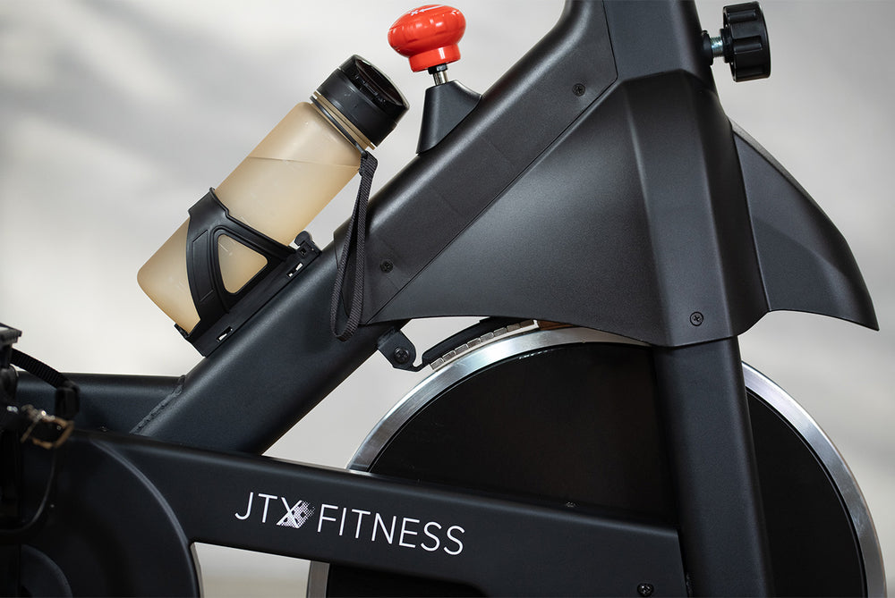 Bottle holder, emergency break and front flywheel of the JTX Cyclo-3M exercise bike.