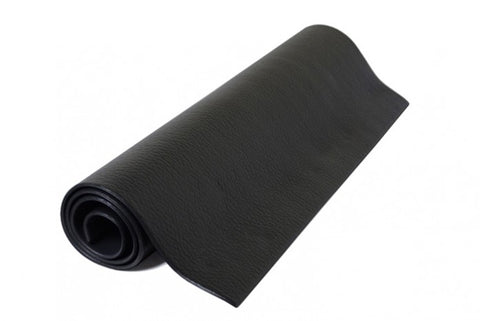 Rolled up black exercise mat on a white background.