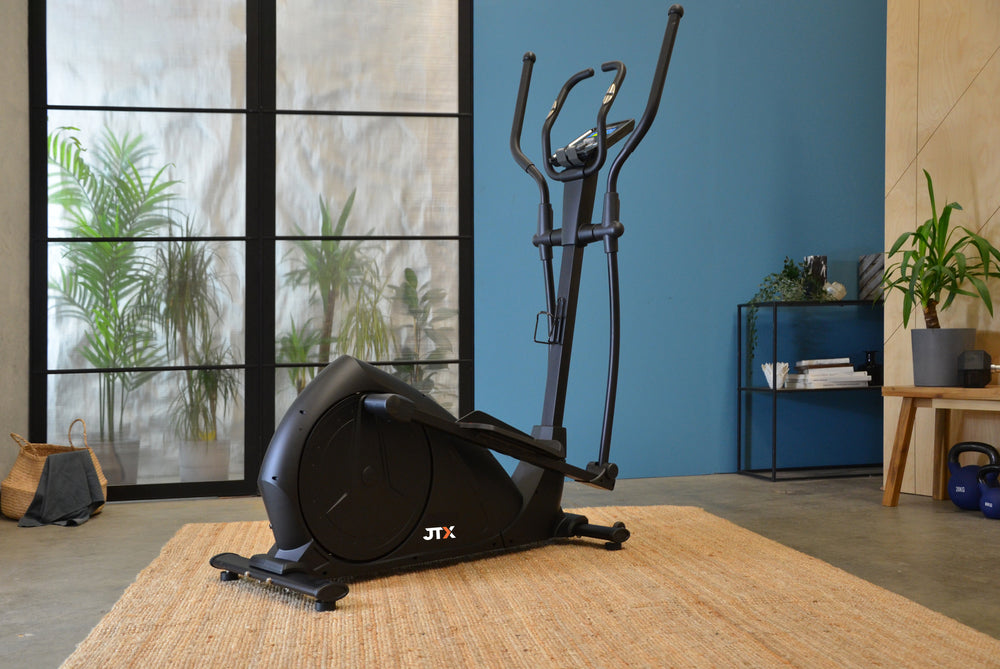 JTX Strider-X8 cross trainer in a modern living room.