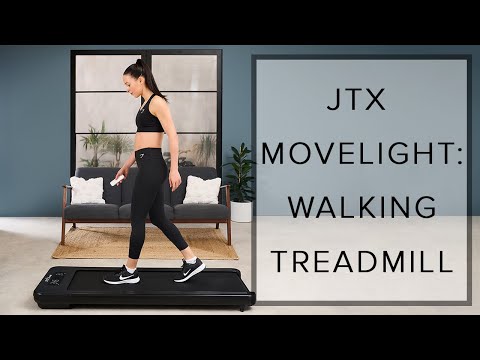 Woman walking on a JTX MoveLight walking pad in their living room.