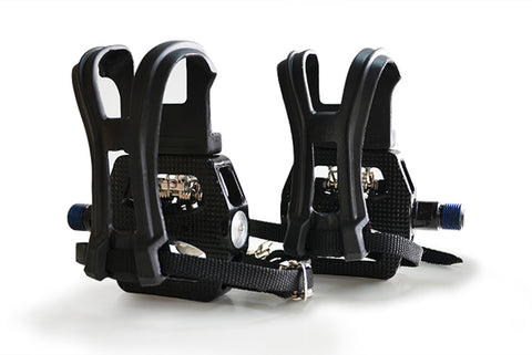 Pair of black SPD bike pedals on a white background.